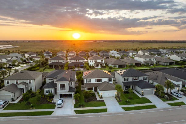 Aerial view of a neighborhood at sunset