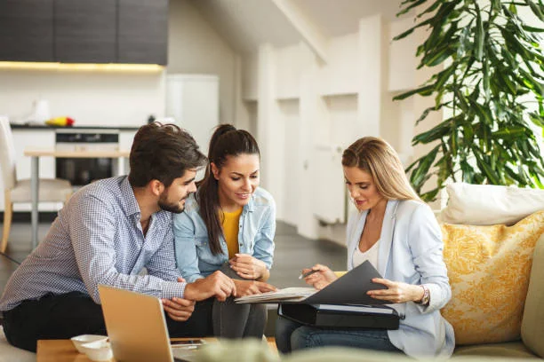 Couple meeting with a leasing agent